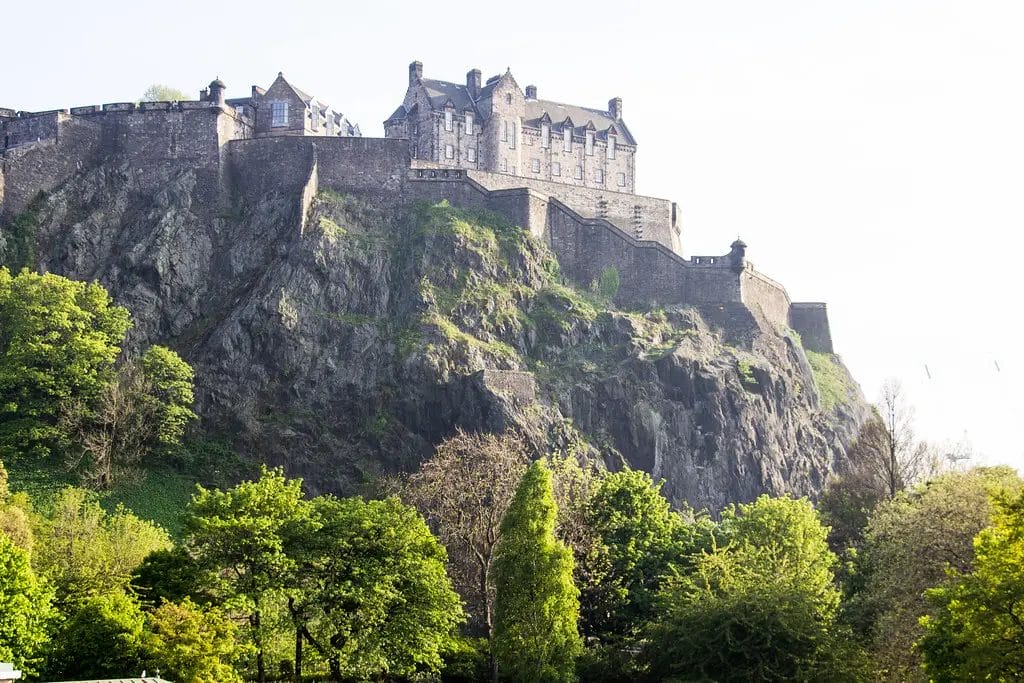 a castle on a hill with Edinburgh Castle in the background
