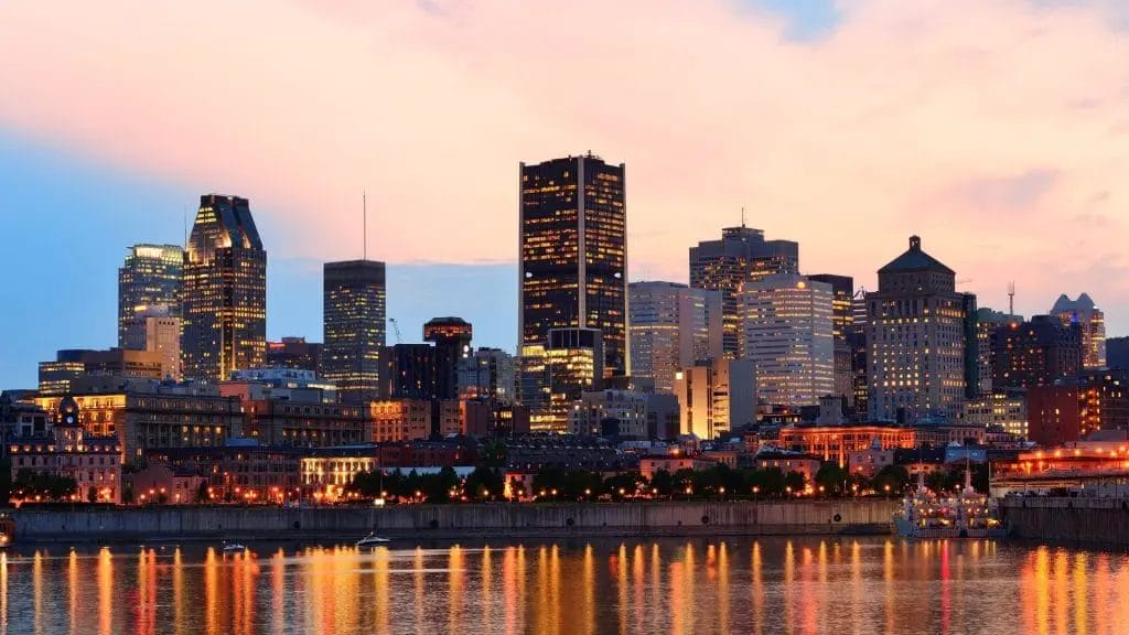 Montreal Over River At Sunset